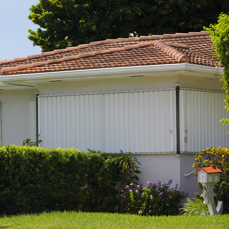 home protected by Accordion Hurricane Shutters in Clearwater, Largo, Palm Harbor, St. Petersburg, Tarpon Springs, FL