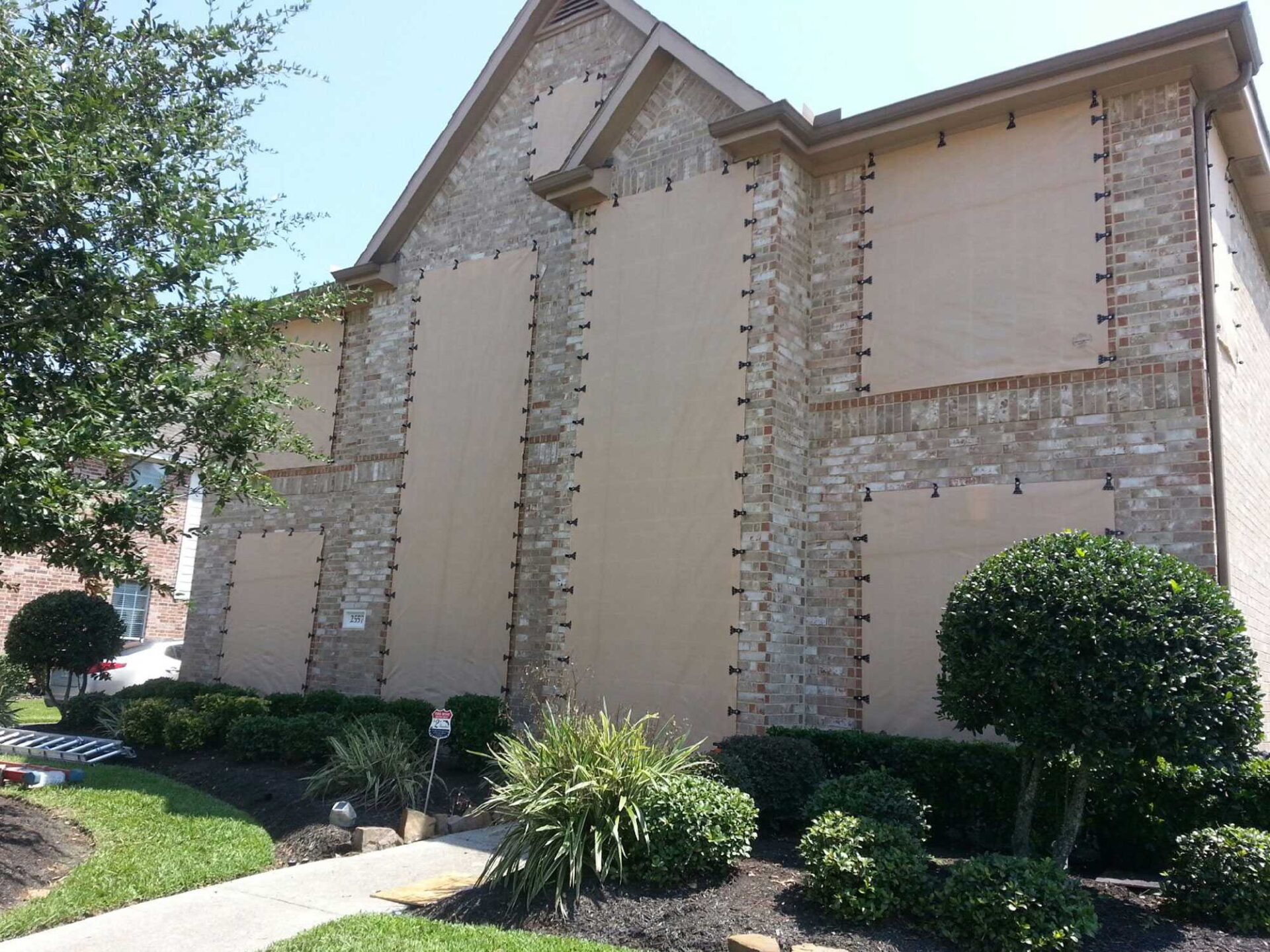 Hurricane Fabric Shutters protecting a building in Clearwater, Largo, Palm Harbor, St. Petersburg, Tarpon Springs, FL